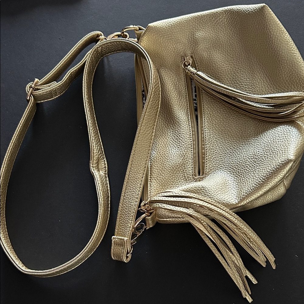 Gold Textured adjustable bag with fringed tassels